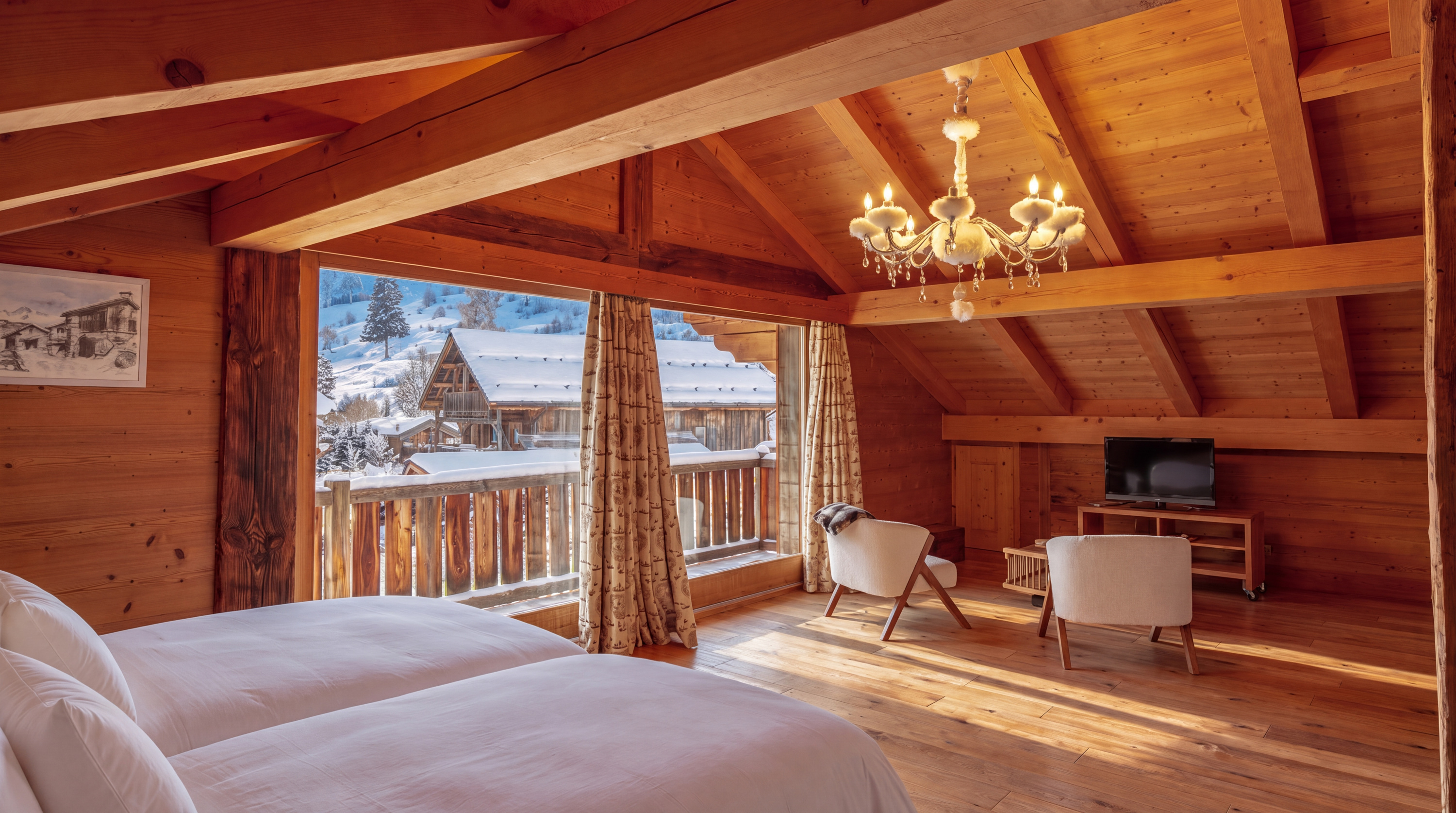 Principal bedroom with view of the snowy village