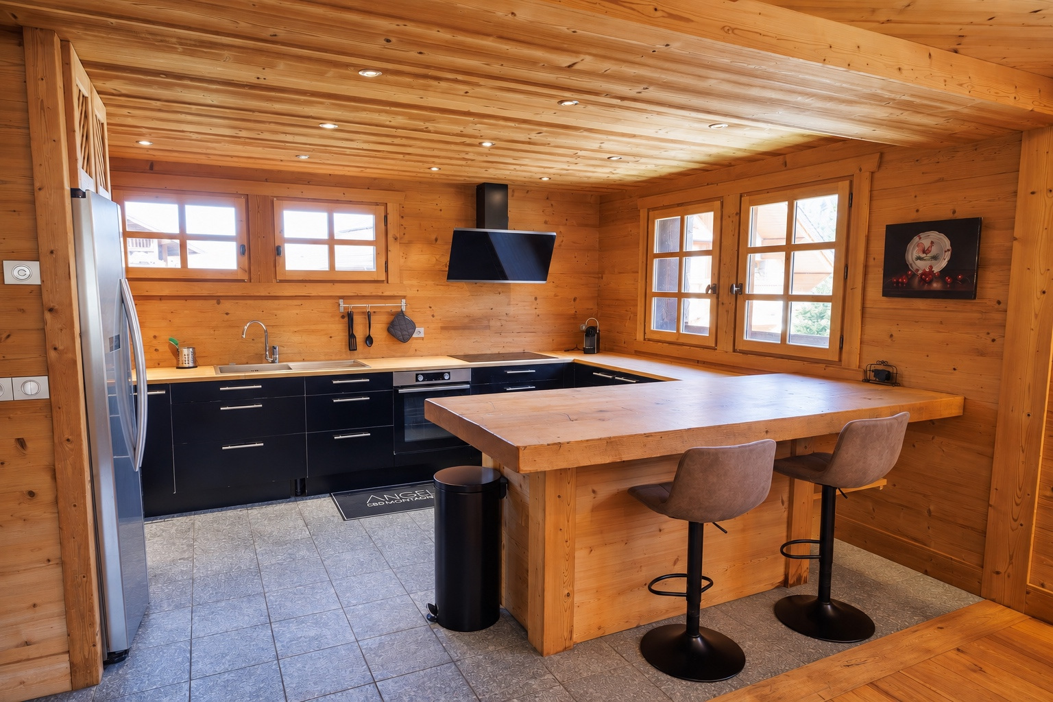 Kitchen with breakfast bar and stools