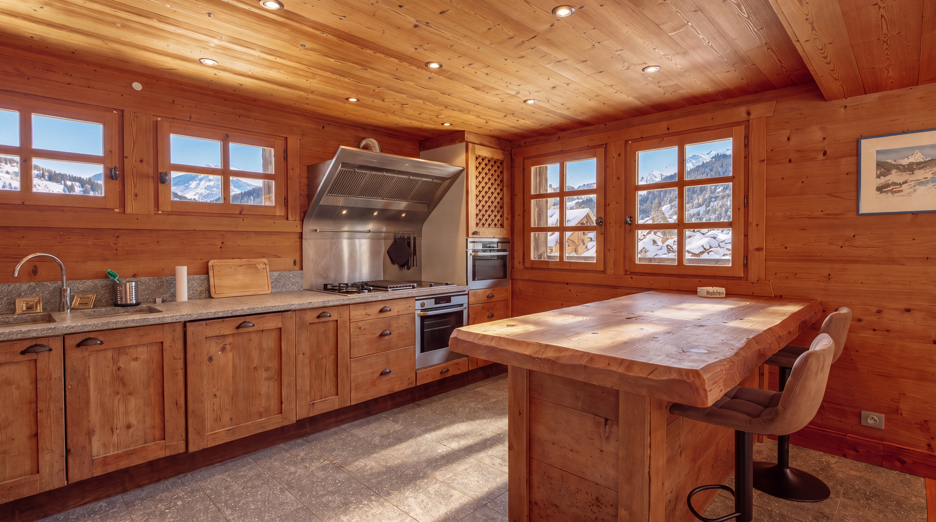 Second kitchen with island and mountain-view windows