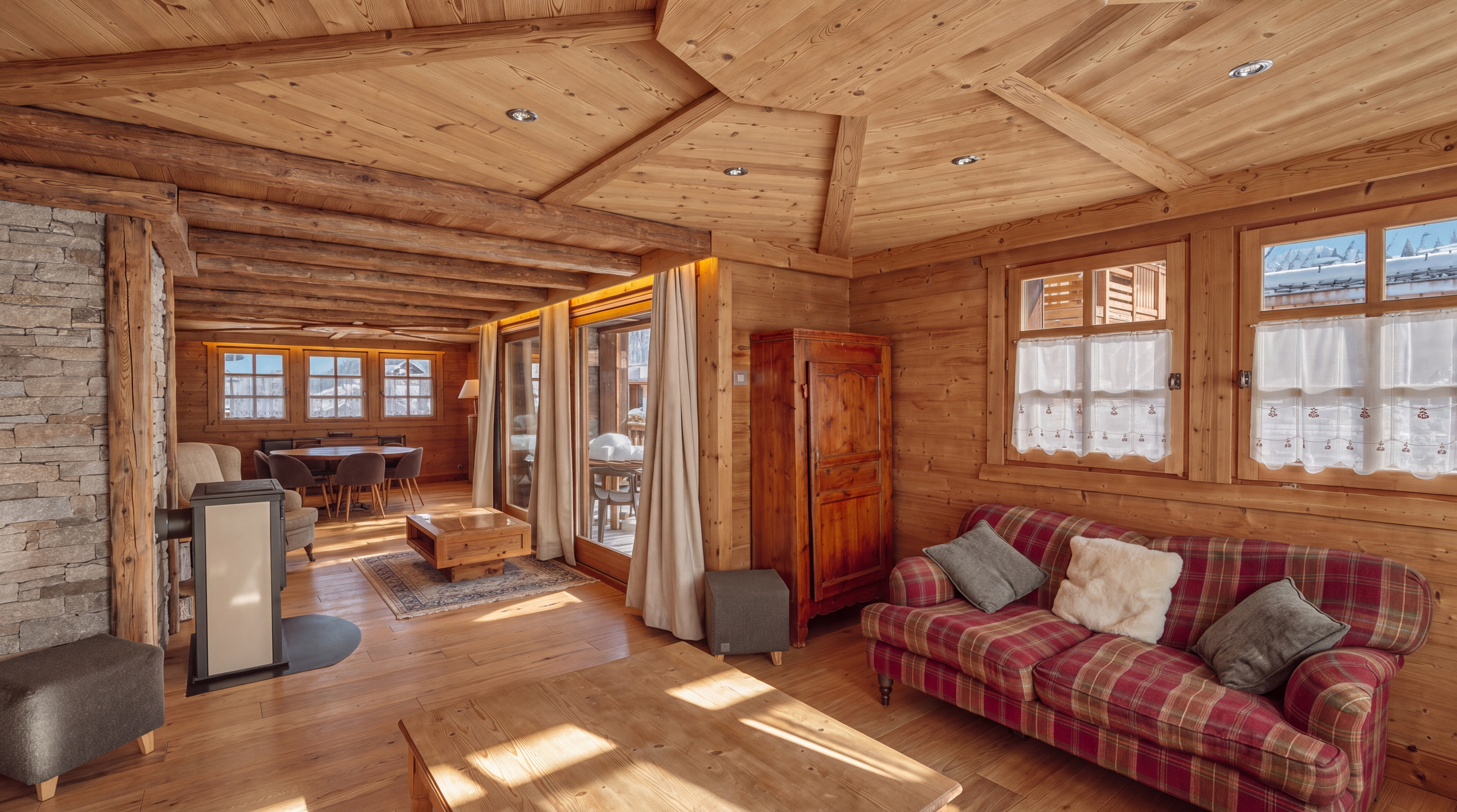 Lounge with checked sofa and wood-burning stove