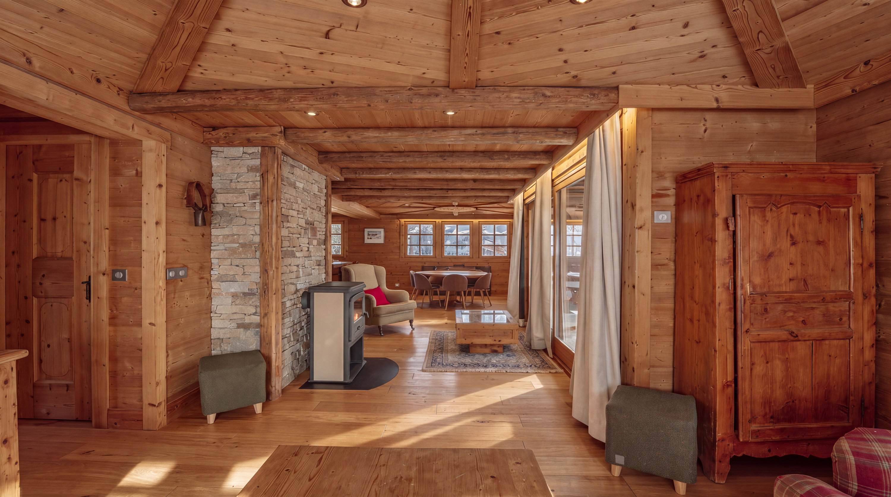 Living space with stone pillar, stove and wardrobe